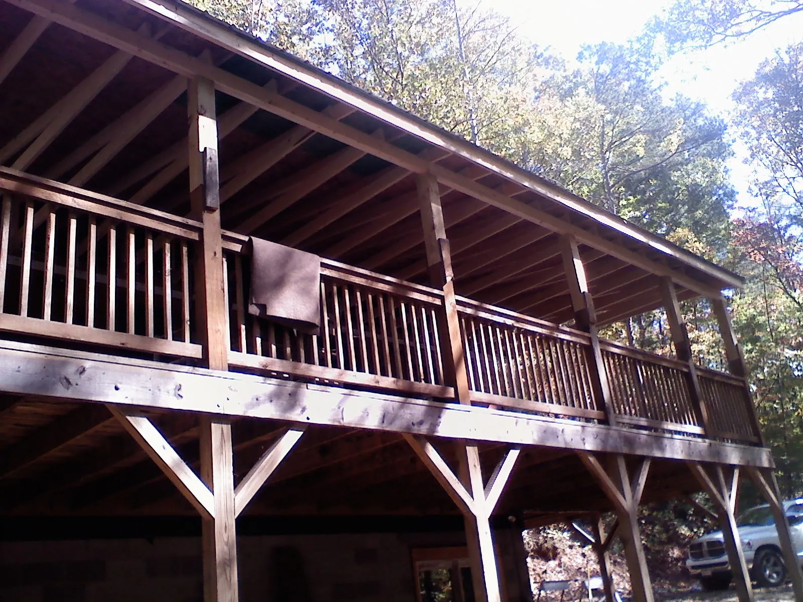 Timber framing under a new elevated porch and deck — Roof Leak Repair in Polk City by Roofing Brothers
